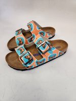 Greta aka The Environmentalist aka Gigi:  CUSTOM BIRKENSTOCKS  by JULES GISSLER x Michael Grey