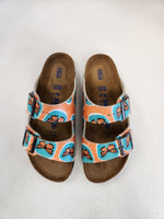 Greta aka The Environmentalist aka Gigi:  CUSTOM BIRKENSTOCKS  by JULES GISSLER x Michael Grey