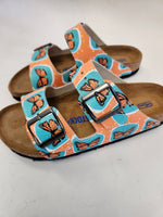 Greta aka The Environmentalist aka Gigi:  CUSTOM BIRKENSTOCKS  by JULES GISSLER x Michael Grey